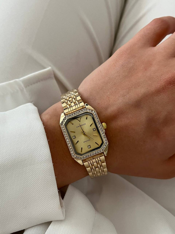 ساعت زنانه نگین دار طلایی استیل